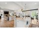 Spacious kitchen with island open to living and dining areas, creating a seamless flow at 924 Mciver St, Mount Pleasant, SC 29464