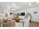 Open living area with an accent wall, comfortable seating, and stylish furnishings at 924 Mciver St, Mount Pleasant, SC 29464
