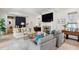 Comfortable living room with a brick fireplace, TV, and plush seating at 924 Mciver St, Mount Pleasant, SC 29464
