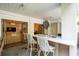 Beautiful outdoor kitchen with marble countertop, bar seating and direct access to the indoor living space at 924 Mciver St, Mount Pleasant, SC 29464