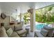 Relaxing outdoor lounge area with views of the pool, a bar, and comfortable seating at 924 Mciver St, Mount Pleasant, SC 29464