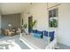 Relaxing front porch with seating, throw pillows, and a charming porch swing at 924 Mciver St, Mount Pleasant, SC 29464