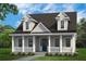 Charming home with a covered porch, white columns, dormer windows, and a well-manicured lawn at 100 E Carolina Ave, Summerville, SC 29483