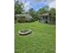 An inviting backyard space with a fire pit and room for outdoor activities at 101 Brittany Ct, Summerville, SC 29485