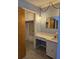 Bathroom features a vanity with stylish lighting and carpeted floors at 101 Brittany Ct, Summerville, SC 29485