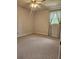 Cozy bedroom with plush carpet flooring, neutral walls, window, and ceiling fan at 101 Brittany Ct, Summerville, SC 29485