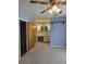 Bedroom with ceiling fan, carpet, and vanity with mirror at 101 Brittany Ct, Summerville, SC 29485