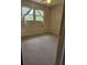 Standard bedroom features carpet flooring, neutral walls, and window with decorative curtains at 101 Brittany Ct, Summerville, SC 29485