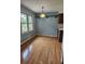 Dining space features hardwood floors, natural light, and view of exterior at 101 Brittany Ct, Summerville, SC 29485