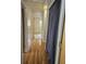 Hallway with hardwood floors and access to bedrooms at 101 Brittany Ct, Summerville, SC 29485