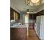 An eat-in kitchen showcases modern appliances and countertops, flowing into adjacent dining space at 101 Brittany Ct, Summerville, SC 29485