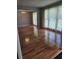 Spacious living room with hardwood floors, large windows, and natural light at 101 Brittany Ct, Summerville, SC 29485