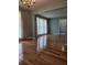 Living room featuring wood floors, natural light, and a decorative chandelier at 101 Brittany Ct, Summerville, SC 29485