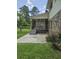 Screened porch with outdoor seating area, accessible from the backyard at 101 Brittany Ct, Summerville, SC 29485
