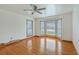 Sunny bedroom with hardwood floors, bay window, ceiling fan, and plenty of natural light at 1023 Striper Ave, Moncks Corner, SC 29461