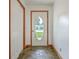 Foyer with a unique stone floor and a view through the decorative front door at 1023 Striper Ave, Moncks Corner, SC 29461