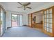 Sun room with sliding glass doors that lead to a deck, and view of backyard at 1023 Striper Ave, Moncks Corner, SC 29461
