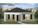 Charming single-story home with gray siding, black shutters, and a well-manicured lawn at 103 River Hill Rd, Goose Creek, SC 29445