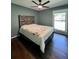 Cozy bedroom with wood floors, neutral colors, and natural light, creating a serene atmosphere at 1039 Grand Concourse St, Charleston, SC 29412