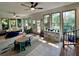 Sun-filled living room with multiple windows, cozy seating, and a fun area, perfect for Gathering gatherings at 1039 Grand Concourse St, Charleston, SC 29412