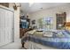 Comfortable bedroom featuring a cozy bed, dresser, and window views at 107 Oakbluff Rd, Summerville, SC 29485