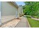 Exterior side of the home featuring a well-kept walkway and easy access door for functionality at 107 Oakbluff Rd, Summerville, SC 29485