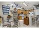 Light and airy kitchen with a vaulted ceiling, skylight, breakfast area, and fun marine decor at 107 Oakbluff Rd, Summerville, SC 29485