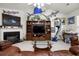 Cozy living room with a fireplace, built-in shelving, and unique decor at 107 Oakbluff Rd, Summerville, SC 29485