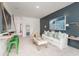 Cozy living room with playful decor, sofa, chairs, and a ladder at 108 Orchard Blossom Ln, Summerville, SC 29485