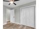 Bedroom features wood-look flooring and closet with bifold doors at 110 Farm Rd # A, Goose Creek, SC 29445