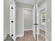 Hallway featuring a small closet with open doors at 110 Farm Rd # A, Goose Creek, SC 29445