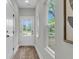 Charming entryway featuring stylish flooring, a decorative rug, and natural light streaming through the door at 110 Farm Rd # A, Goose Creek, SC 29445