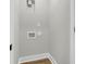 Small laundry room with washer and dryer hookups and wood-look flooring at 110 Farm Rd # A, Goose Creek, SC 29445
