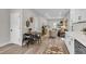 Open-concept living area with modern decor, wood floors, and natural light at 110 Farm Rd # A, Goose Creek, SC 29445
