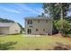 The home backyard features a grassy lawn and a view of the house at 110 Yorkshire Dr, Summerville, SC 29483