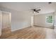 Bright bedroom with wood-look floors, a ceiling fan, and a window with natural light at 110 Yorkshire Dr, Summerville, SC 29483