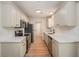 Modern kitchen featuring stainless steel appliances, white cabinets, and marble countertops at 110 Yorkshire Dr, Summerville, SC 29483
