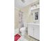 Clean bathroom featuring bright lights, shower/tub combo and white vanity and toilet at 1104 Greenmeadow Dr, Goose Creek, SC 29445