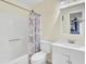 Bathroom featuring white vanity, toilet and tub with shower curtain at 1104 Greenmeadow Dr, Goose Creek, SC 29445