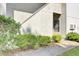 Attractive condo with well-maintained landscaping and exterior stairs to the front entrance at 1104 Greenmeadow Dr, Goose Creek, SC 29445