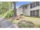 Charming home with lots of trees, a well maintained lawn, and light-colored siding at 1104 Greenmeadow Dr, Goose Creek, SC 29445