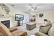 Cozy living room featuring a fireplace, TV, and comfortable seating at 1104 Greenmeadow Dr, Goose Creek, SC 29445