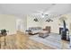 Comfortable living room featuring a ceiling fan, nice flooring, and decor at 1104 Greenmeadow Dr, Goose Creek, SC 29445