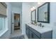 Bathroom featuring dual sink vanity, tile flooring, and neutral color palette at 111 Augusta Pass Dr, Ridgeville, SC 29472
