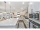 Well-appointed kitchen with quartz countertops, shaker cabinets, and stainless appliances at 111 Augusta Pass Dr, Ridgeville, SC 29472