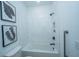 Bright bathroom features white tile shower and tub at 111 Augusta Pass Dr, Ridgeville, SC 29472