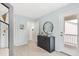 Comfortable bedroom boasts modern dresser and decor with a door leading to a balcony at 112 Orchard Blossom Ln, Summerville, SC 29485