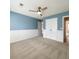 Spacious bedroom features plush carpeting, a ceiling fan, and ample closet space at 113 Rockdale Ln, Goose Creek, SC 29445