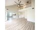 Bright living room with vaulted ceiling, ceiling fan, second story, and light hardwood floors at 113 Rockdale Ln, Goose Creek, SC 29445
