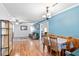 Open concept living space with hardwood floors, a dining area, and a cozy living room at 113 Surrey Dr, Summerville, SC 29486